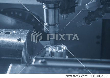 The 5-axis CNC milling machine hole boring the automotive part with solid end mill tools. The 5-axis CNC milling machine hole boring the automotive part with solid end mill tools. 112403406