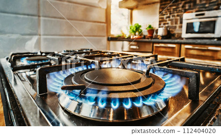 Close-up of a Modern Kitchen Stove with Blue Flames Burning - Generative Ai 112404020