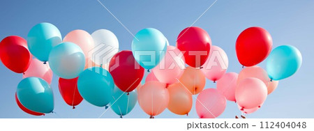 AI-generated content. Hands holding colorful balloons against blue sky, concept of celebration and joy 112404048