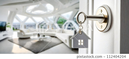 House Key with house Shaped Keychain and Modern Living Room - Generative Ai 112404204