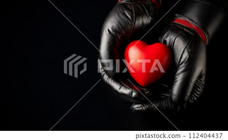Black Boxing Gloves Holding a Red Heart on a Black Background - Generative Ai 112404437