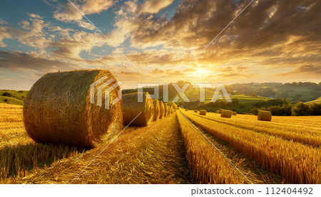 Row of Hay Bales on a Golden Beautiful Landscape at Sunrise - Generative Ai Row of Hay Bales on a Golden Beautiful Landscape at Sunrise - Generative Ai 112404492