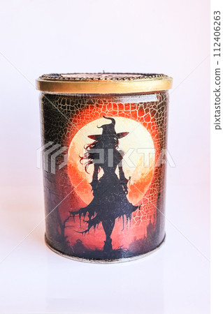 Handmade textured decoupage can with witch silhouette on big moon background with beautiful decorated lid 112406263