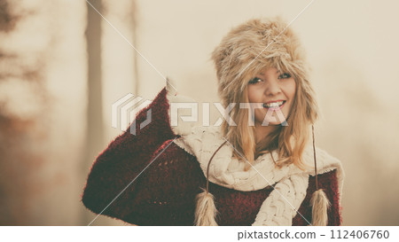 Pretty fashion woman in fur winter hat. Pretty fashion woman in fur winter hat. 112406760