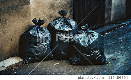 Black Garbage Bags Abandoned on a City Street - Generative Ai 112406864