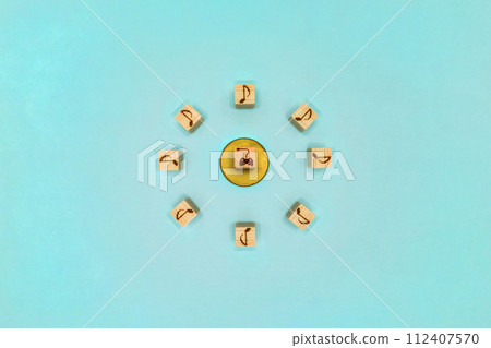 An image of enjoying a game with musical notes arranged around a golden badge game controller 112407570