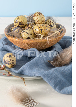 Quail eggs in a ceramic bowl Quail eggs in a ceramic bowl 112407758
