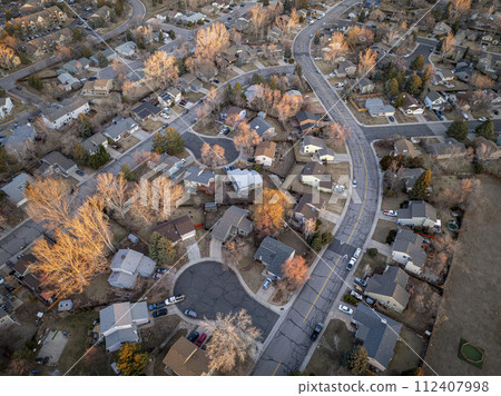 winter morning over a residential street in Fort Collins in northern Colorado, aerial view winter morning over a residential street in Fort Collins in northern Colorado, aerial view 112407998