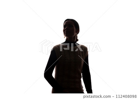 Young woman looking up - horizontal silhouette 112408098