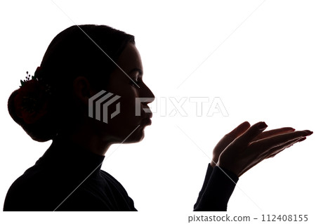 Young woman shows his hands forward, sending a kiss Young woman shows his hands forward, sending a kiss 112408155