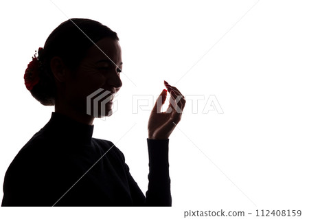 Young woman with smile shows his hand up in embarrassment Young woman with smile shows his hand up in embarrassment 112408159