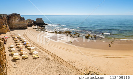 Scenic golden cliffs near Alvor Scenic golden cliffs near Alvor 112409116