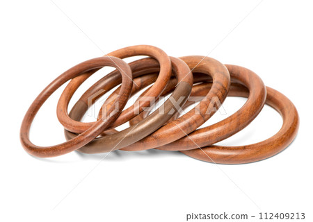 Wooden bracelets on white 112409213