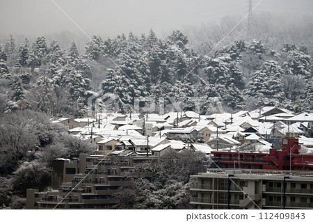 snow-covered roof of a house snow-covered roof of a house 112409843