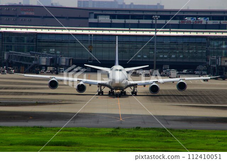 Wings go to Europe... Jumbo jet "B747" moving on the ground for takeoff Wings go to Europe... Jumbo jet "B747" moving on the ground for takeoff 112410051