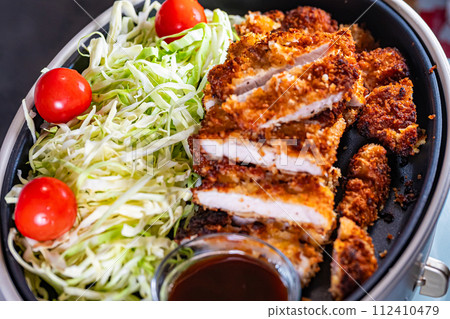 Food: cutlet and cabbage salad 112410479