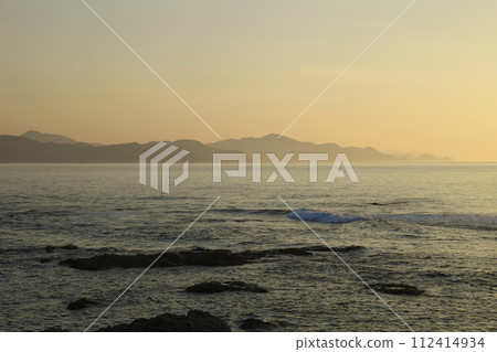 Sunset seen from Goshiki Beach at sunset over Ura Sunset seen from Goshiki Beach at sunset over Ura 112414934