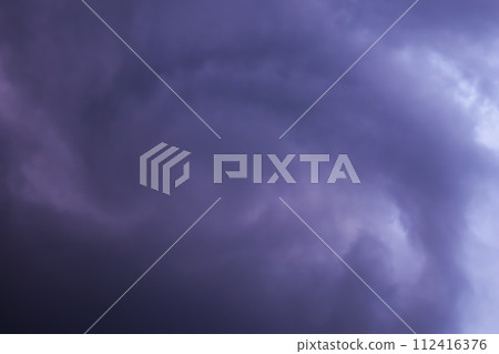 Clouds in the sky during a thunderstorm as a background. Clouds in the sky during a thunderstorm as a background. 112416376
