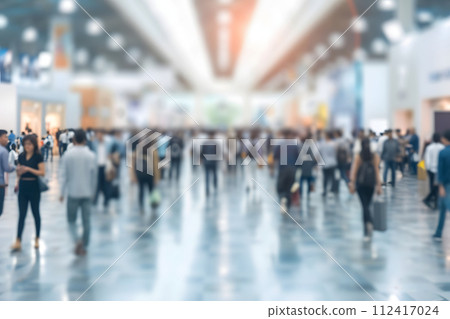 Dynamic Blur: People in Exhibition Hall at Trade Show Expo Dynamic Blur: People in Exhibition Hall at Trade Show Expo 112417024