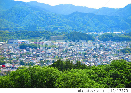 Scenery of mountains and city area seen from the hill 2 112417273
