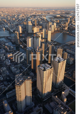 Aerial view of tower apartments in the bay area, sunset, vertical Aerial view of tower apartments in the bay area, sunset, vertical 112417307