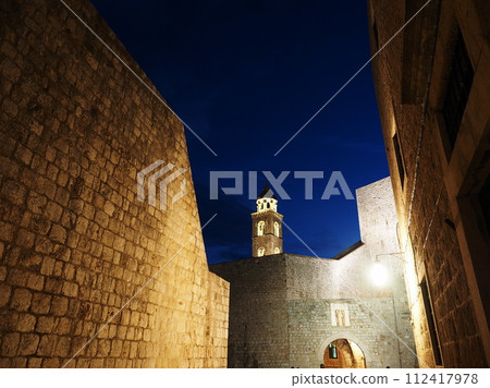 The bell tower of Dubrovnik's old town rises into the night sky The bell tower of Dubrovnik's old town rises into the night sky 112417978