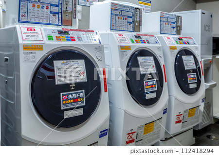 Laundry room with fully automatic washing and drying machines 112418294