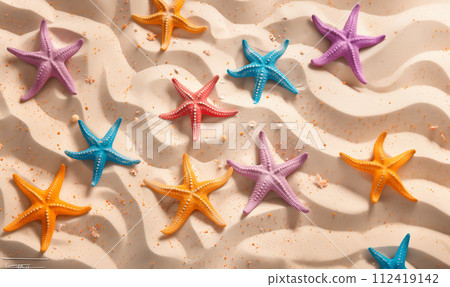 Colorful starfish is scattered across the sandy beach, in the style of minimalist backgrounds. Summer concept 112419142