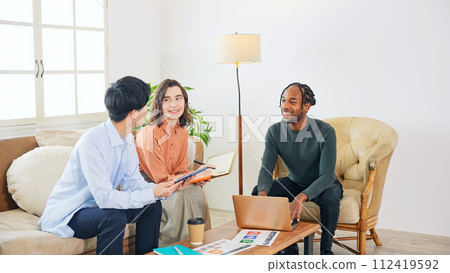 Multinational people chatting in a casual lobby 112419592