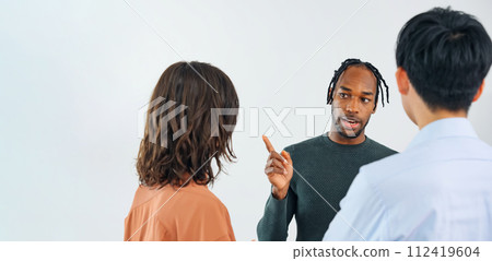 Multinational people standing and talking Multinational people standing and talking 112419604