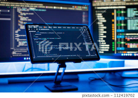 Work from home. Programmer coding code on notebook screen at home. Work from home. Programmer coding code on notebook screen at home. 112419702