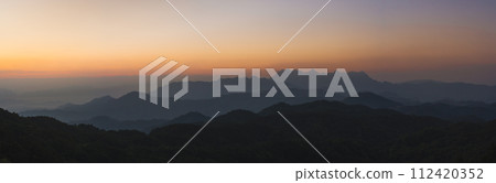nature traveling with panorama orange sky and layer of mountain with sunrise background nature traveling with panorama orange sky and layer of mountain with sunrise background 112420352