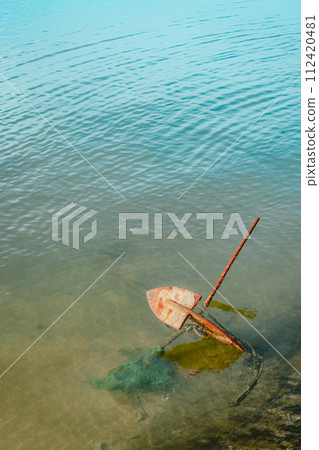 old boat on the river 112420481