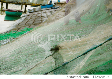 ice hole in water 112420596