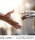 A touch of a human hand and an AI robot 112422655