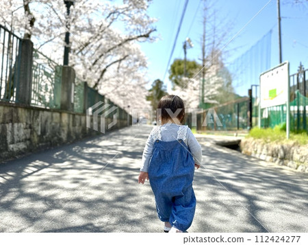 Girl walking near Lake Biwa Canal 2 112424277