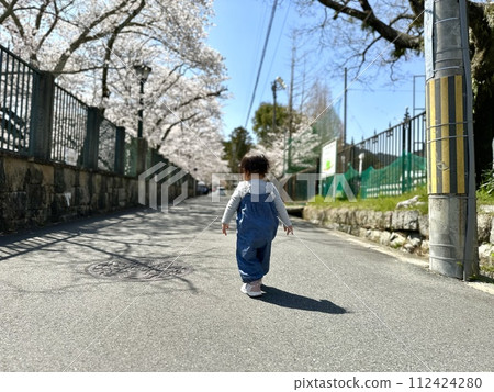 Girl walking near Lake Biwa Canal 1 Girl walking near Lake Biwa Canal 1 112424280
