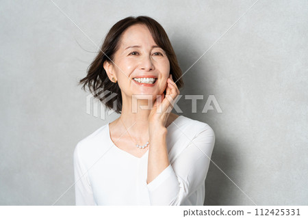 Portrait of a middle-aged woman Portrait of a middle-aged woman 112425331