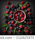 Top view of berries black tea on a table . AI generated. 112425975