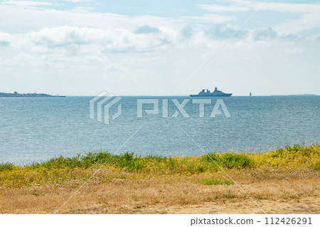 Silhouette of Danish military ship in Baltic sea near Korsor, Denmark 112426291