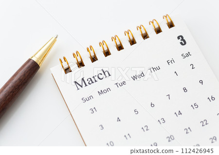 March calendar and ballpoint pen 112426945
