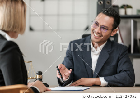 Business and Male lawyers or judge consult having team meetings with clients, Law, and Legal services concept. Customer service good cooperation in office. 112427052