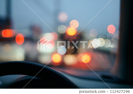 Windshield of a car wet with rain Rainy season image Windshield of a car wet with rain Rainy season image 112427296