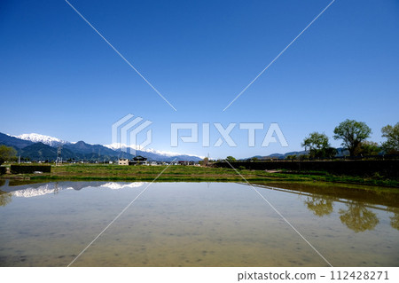 Matsukawa Village, Kitaazumi District, Nagano Prefecture_North side view 2 from the roadside station Azumino Matsukawa parking lot_April 2023 112428271