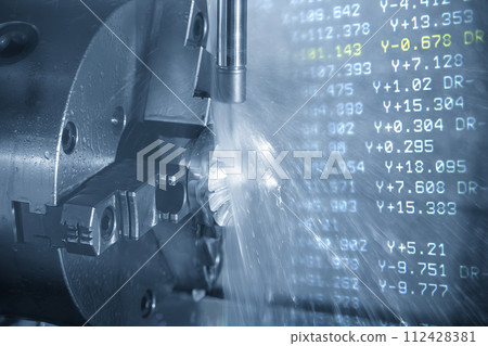 The abstract scene 5-axis CNC milling machine cutting the turbine part and G-code data background. 112428381