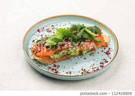 Breakfast toast with salmon and avocado Breakfast toast with salmon and avocado 112428809