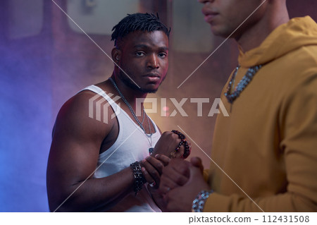 Portrait of cool high hop gangsters in dark city street 112431508
