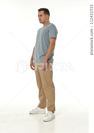 offended frustrated young man on white background. sadness 112431555