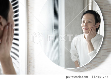 Young men doing skin care Young men doing skin care 112431754