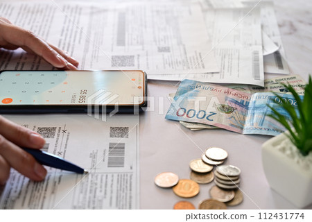 Stressed man shocked with amount to be paid for electricity,financial problem 112431774